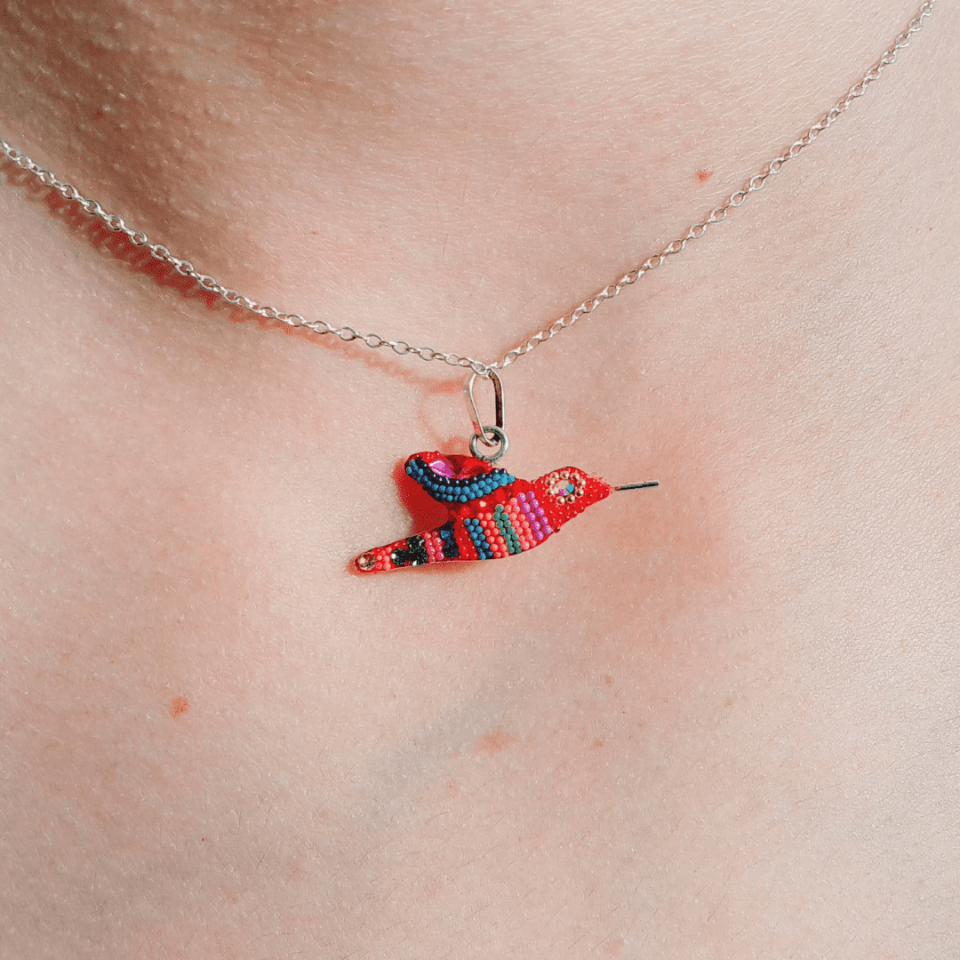 Red Hummingbird: "Luck in Love and Vitality:"